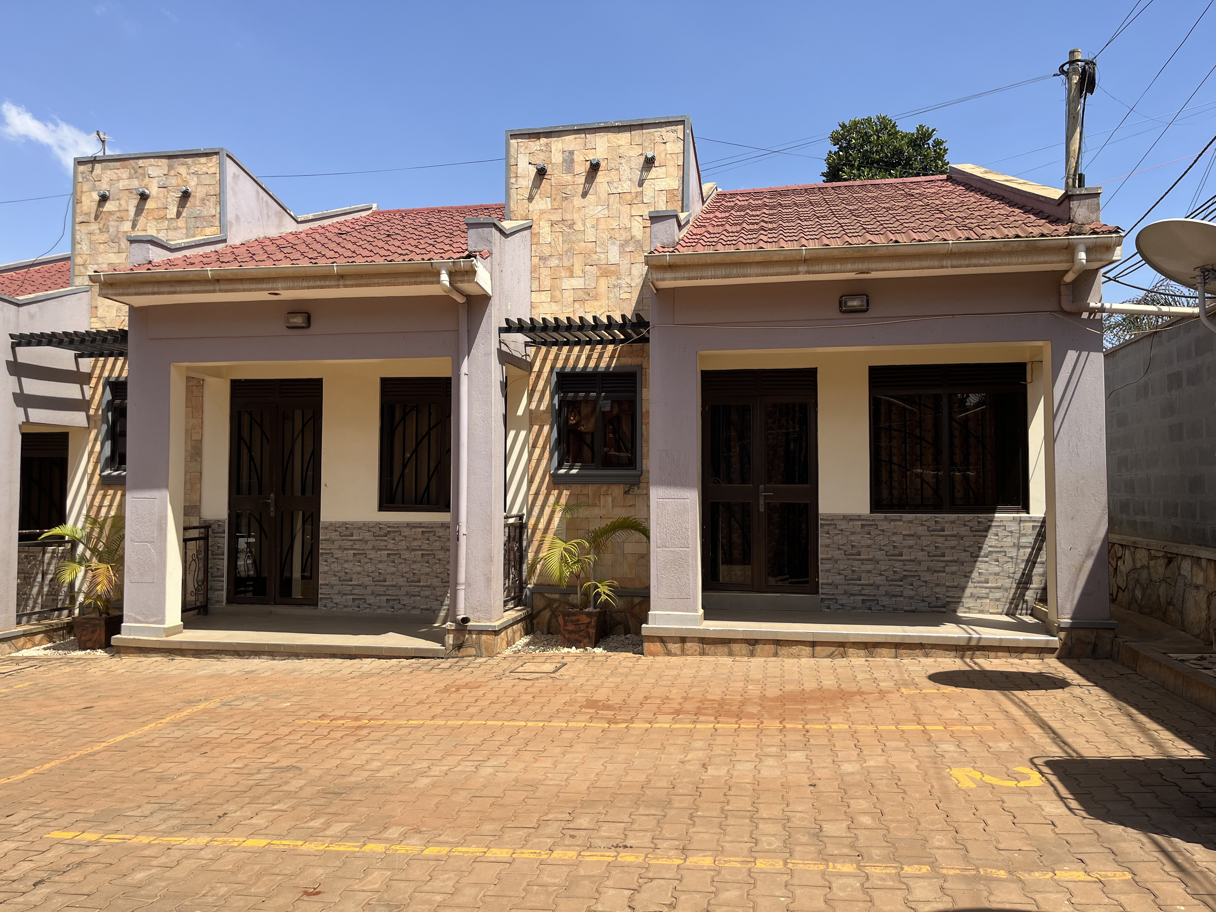 Well-kept apartment investment property with parking and fencing in Wakiso Uganda