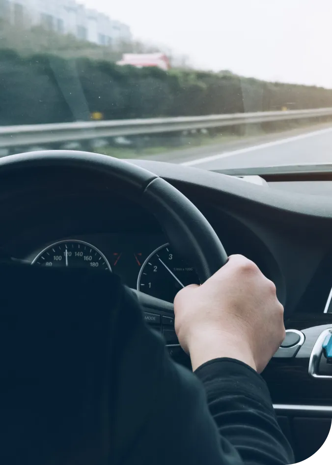 man-driving-car-from-rear-view