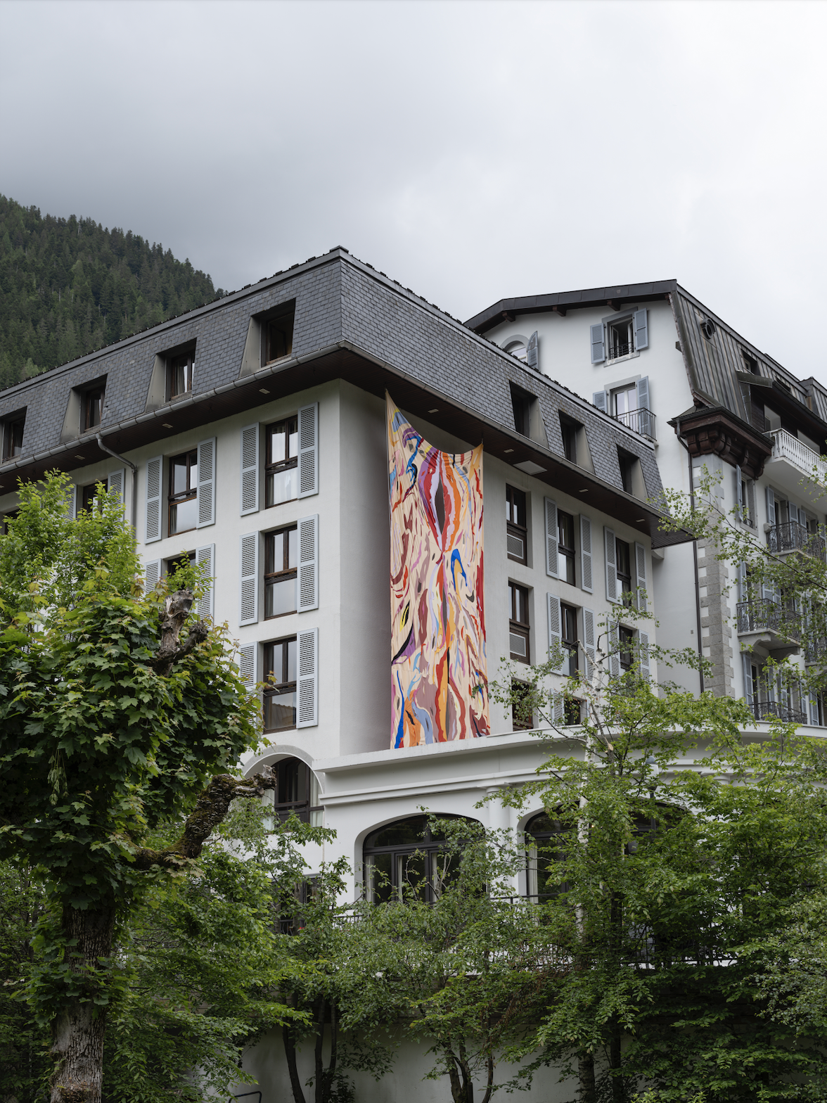 Quiver, Quake, 2023. Sewn patchwork of mixed textiles, 860 x 400 cm. - Artocène Biennale. Chamonix, FR