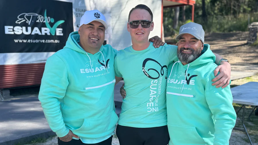 Youth mentor and participant reading Esuarve training material – knowledge and resources hub Queensland
