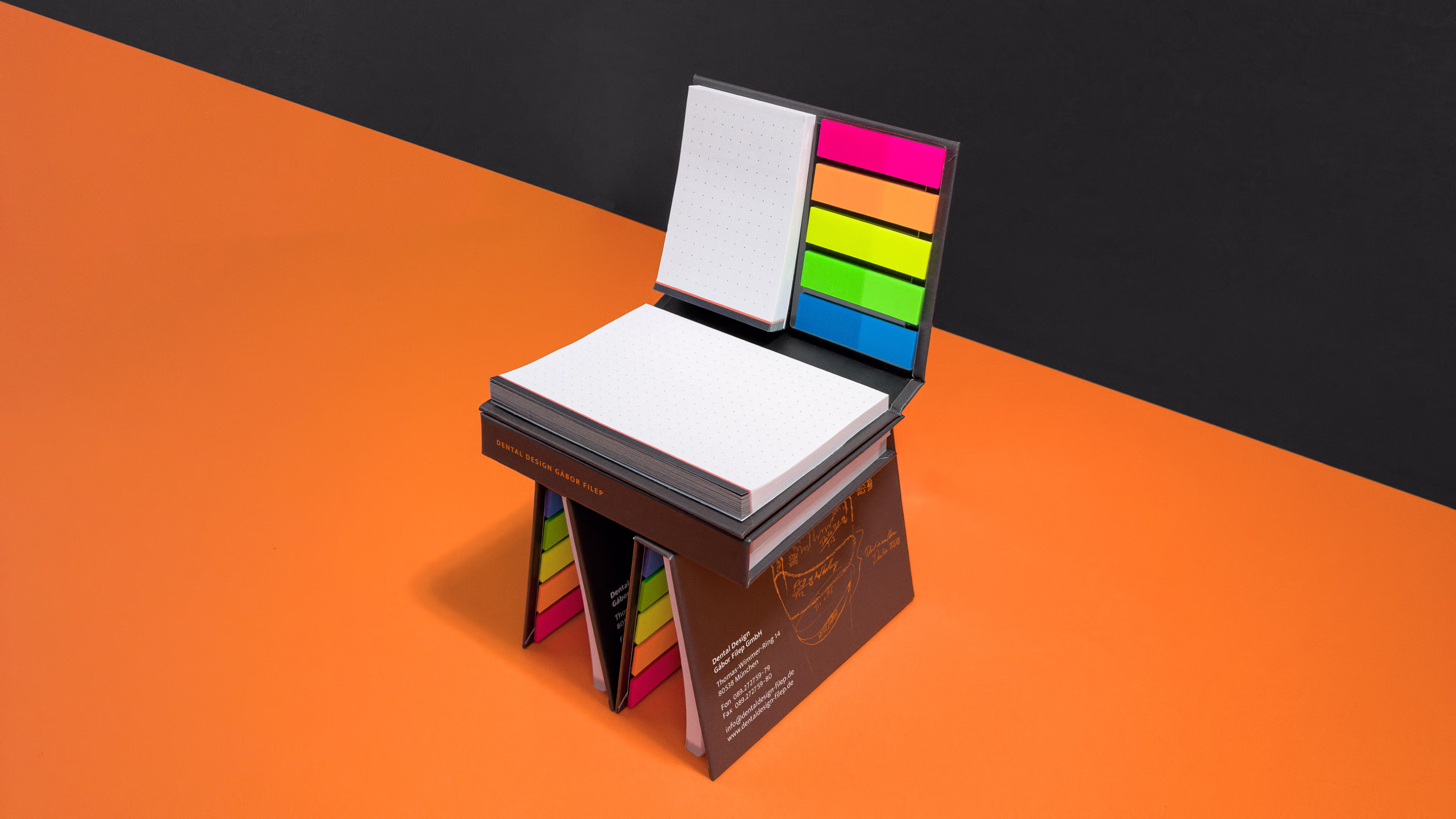 Notizblock mit skulpturalem Element im Corporate Design des Dental-Branding-Case Gábor Filep.