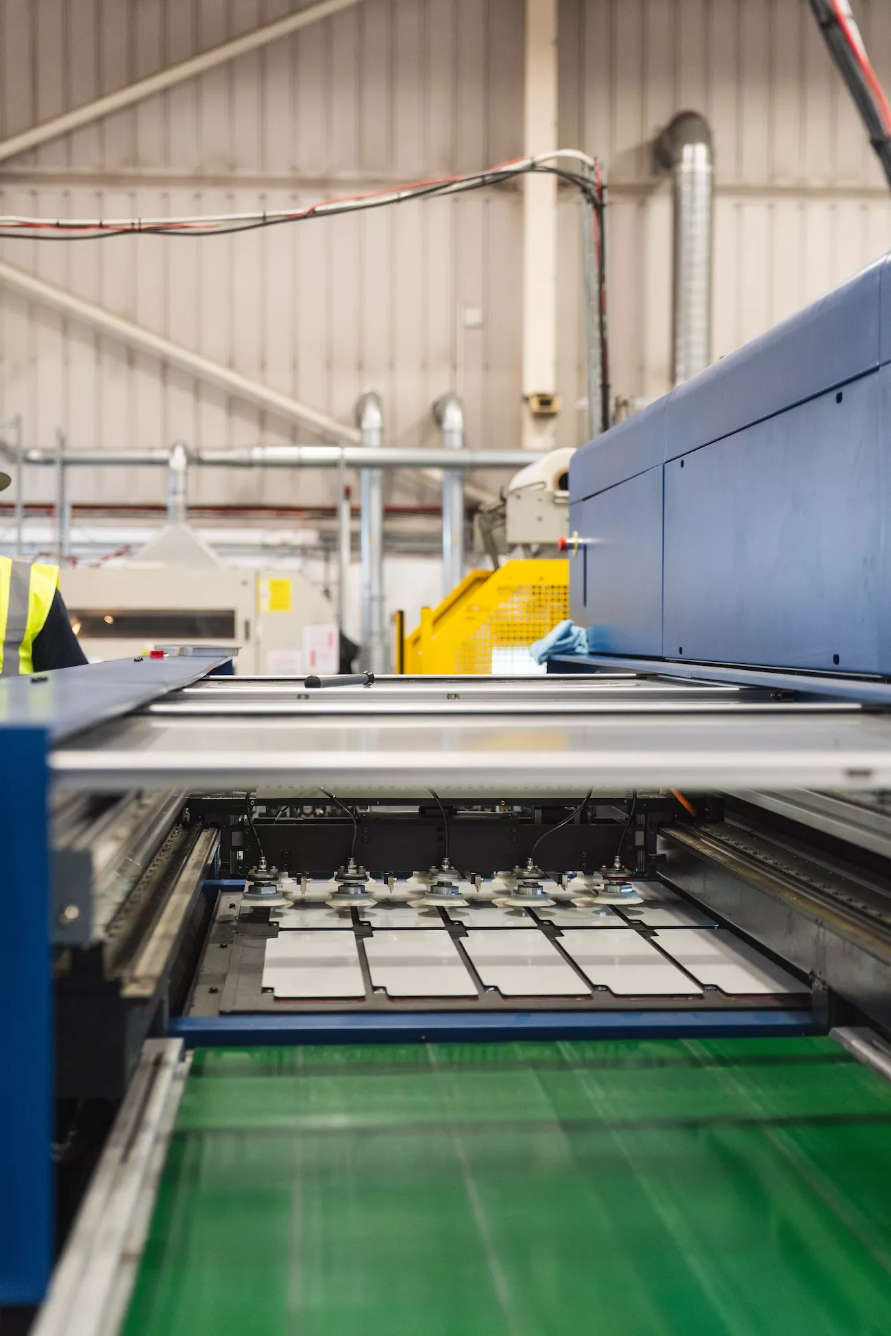 Number plates being manufactured on an automated production line at uGroup UK's UK facility