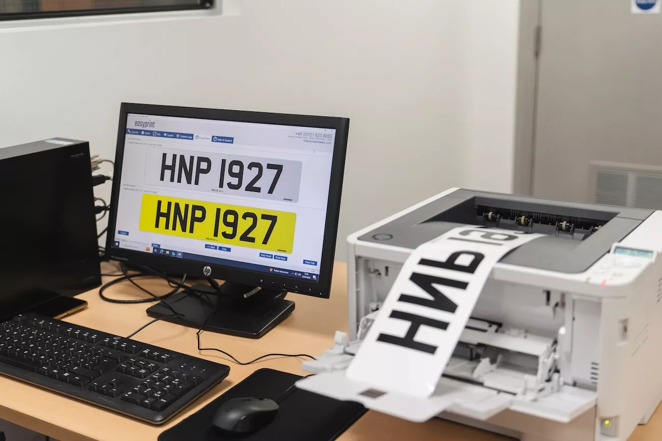 Number plate self-assembly printing system with easyprint software displayed on screen, supplied by uGroup UK for resellers.