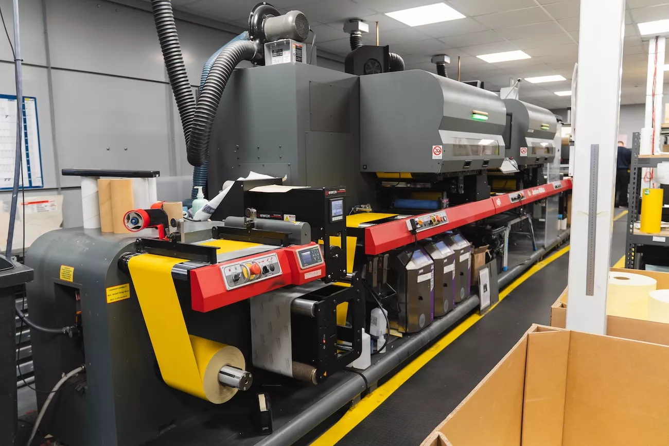 Industrial printing machinery used in the number plate manufacturing process at uGroup UK's UK production facility.