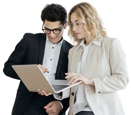 Two young professionals working together on a laptop.