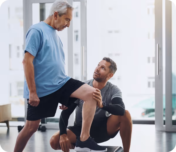 Person wearing Normatec 3 leg compression boots