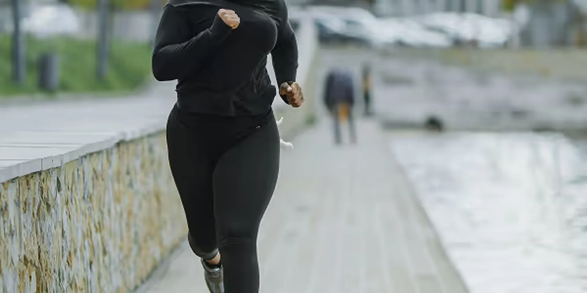 Person wearing Normatec 3 leg compression boots