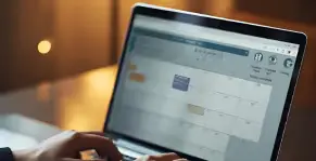 User booking an appointment online using a laptop.