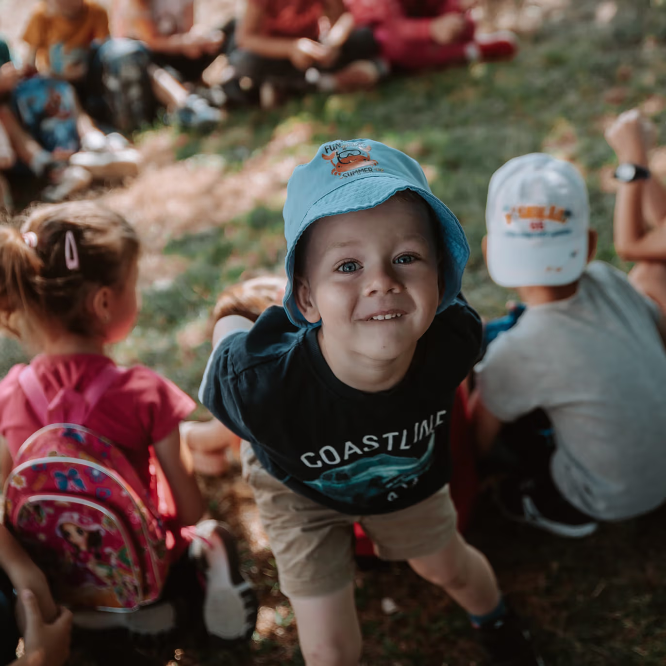 Man walking out of building with backpack on