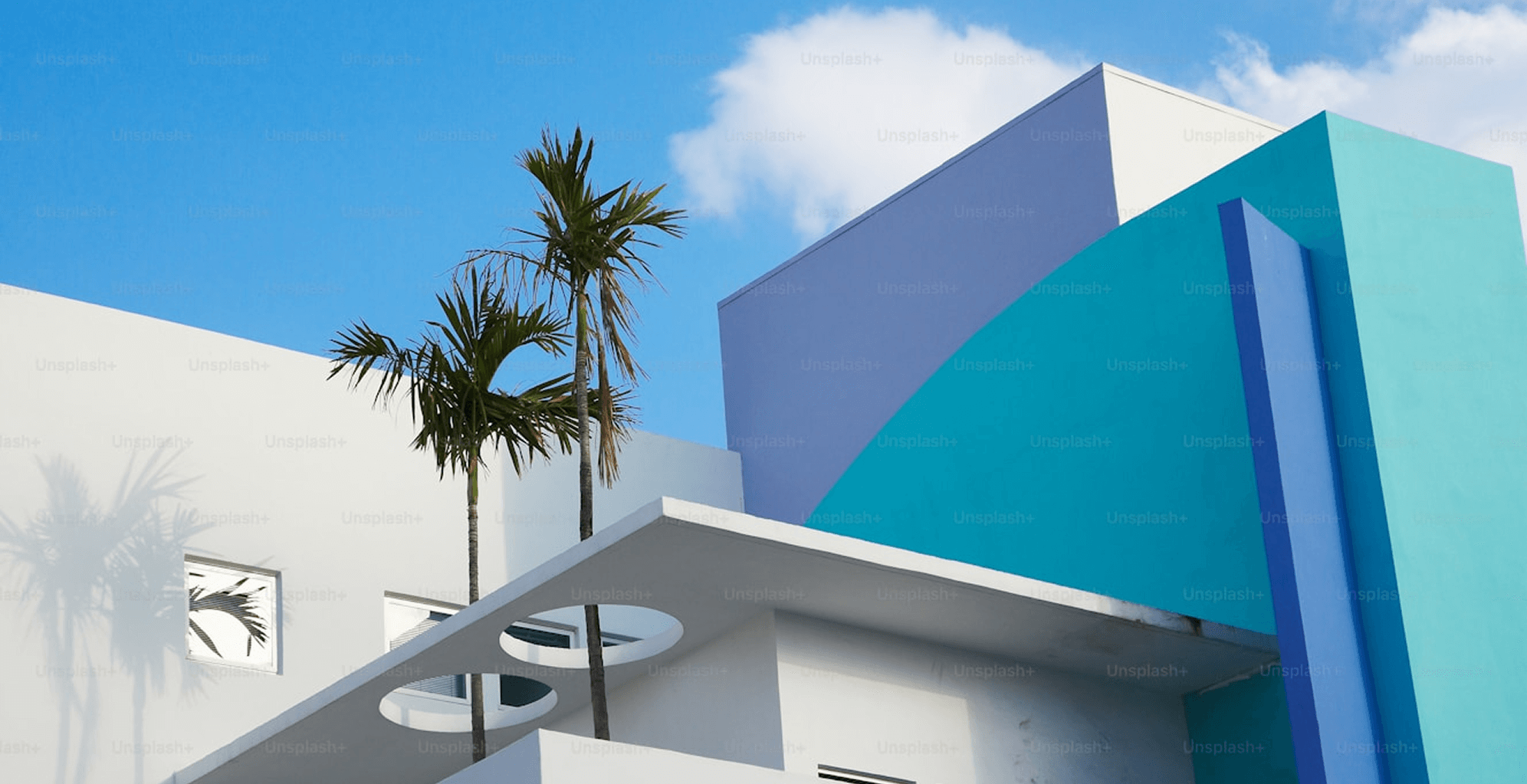 A view of a city skyline at sunset.