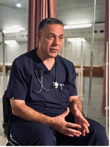 Photo of "Dr. Hussam Abu Safiya" dressed as a medical professional