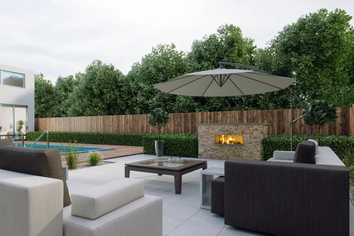 Outdoor fire feature integrated into a residential patio seating area