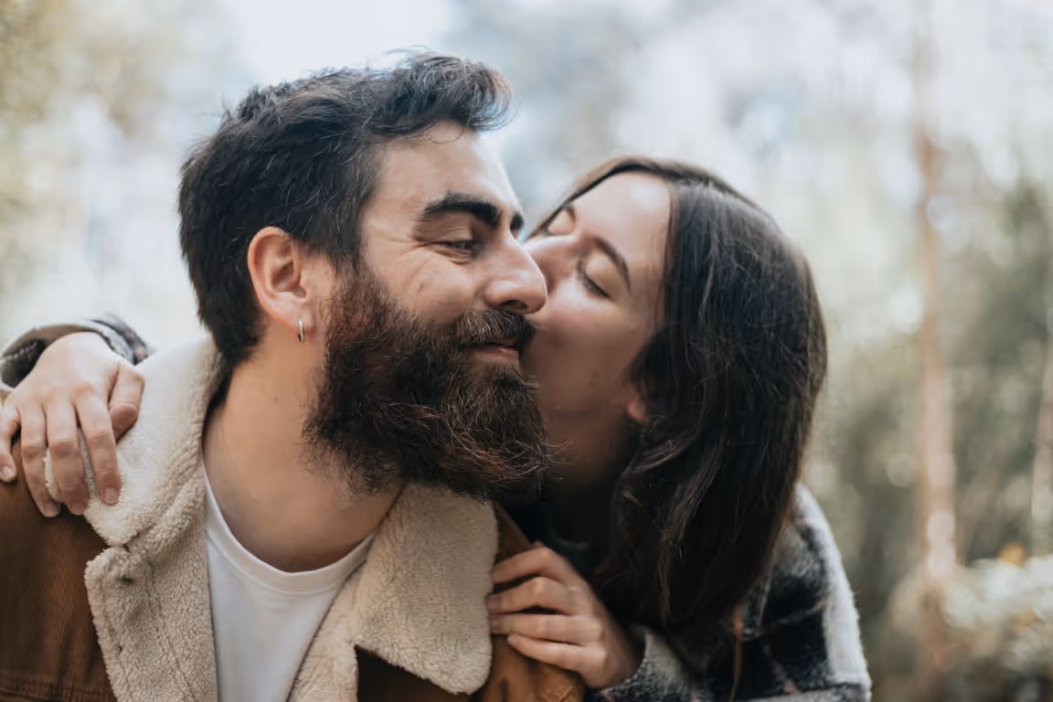 Couple sharing an intimate moment outdoors, representing emotional connection, confidence, and relationship satisfaction supported by sexual enhancement treatments and wellness solutions.