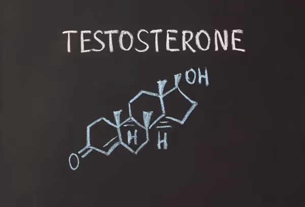 Chalkboard illustration of the testosterone molecular structure labeled “testosterone,” representing a modern, science-based approach to testosterone therapy.