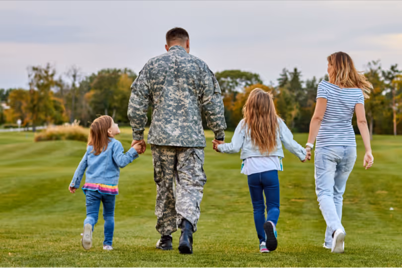 Military veteran walking outdoors with family, representing long-term heart health and quality of life highlighted in a study on the cardiovascular benefits of testosterone replacement.