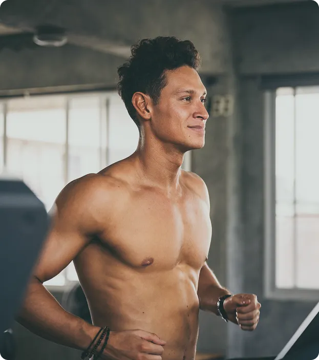 Man smiling after a workout, representing increased energy and improved metabolic support from MIC Lipotropic + B12 injections at Gameday Men’s Health.