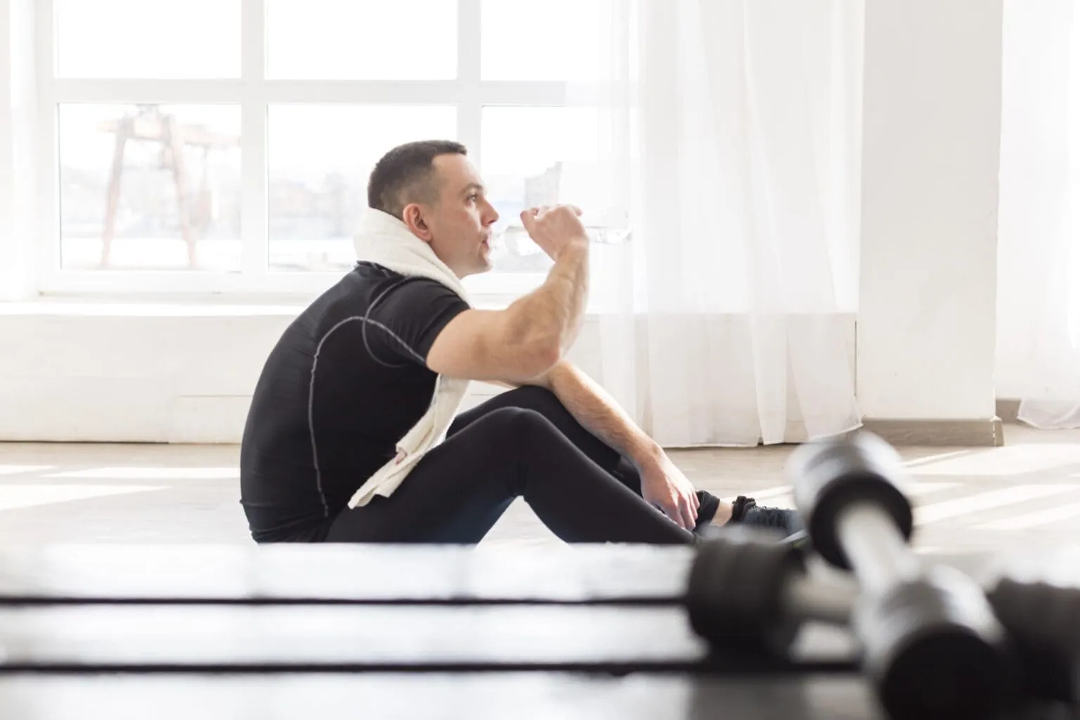 Active man exercising, considering effective methods to lower hematocrit on TRT.