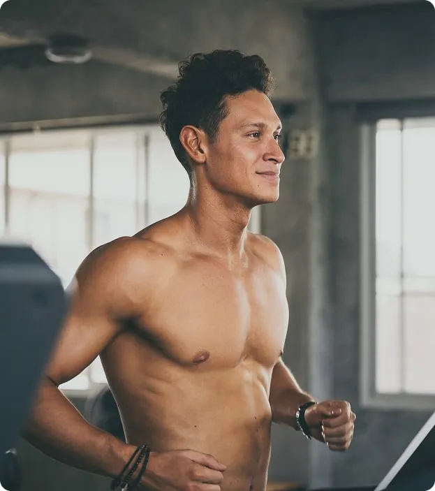 Man smiling after a workout, representing increased energy and improved metabolic support from MIC Lipotropic + B12 injections at Gameday Men’s Health.