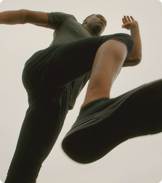 Relaxed man enjoying music outside, symbolizing balance, energy, and lifestyle support associated with Sermorelin injections in Burlington, NC.