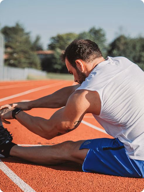 Runner warming up outdoors, symbolizing rehabilitation and performance recovery supported by shockwave therapy treatment in San Mateo County, CA.