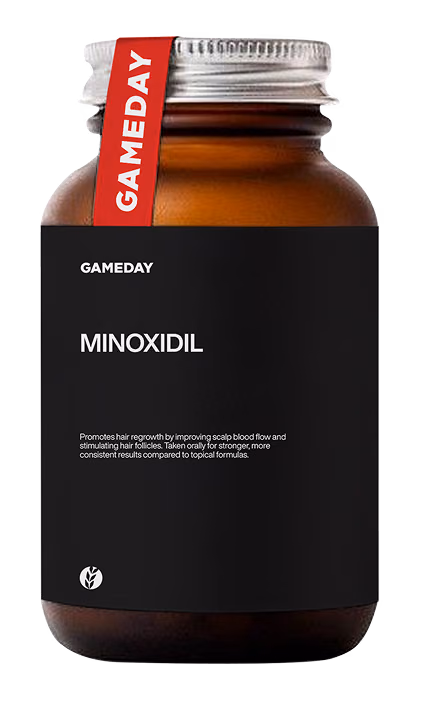 Bottle of Minoxidil medication used to support hair regrowth and reduce thinning as part of clinician-guided treatment in Edwardsville, IL.