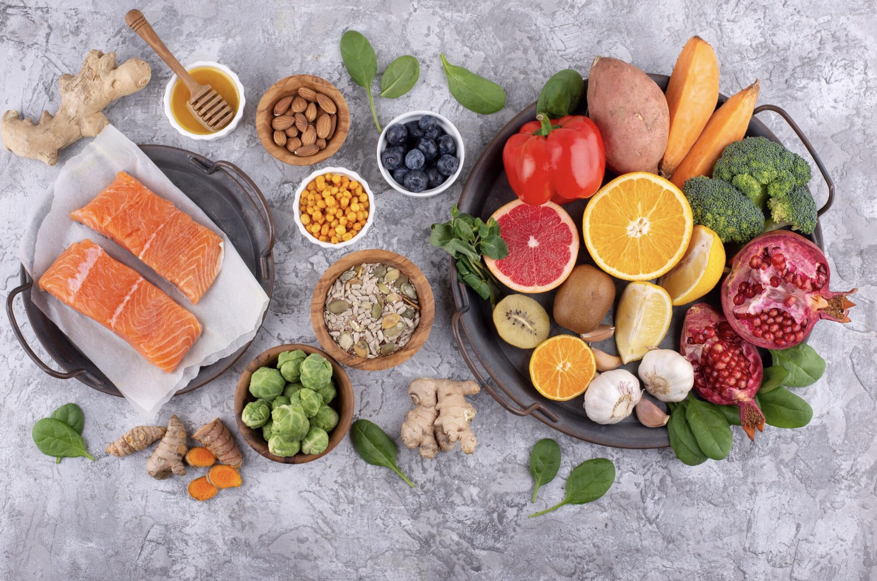 Assortment of vitamin B12-rich foods including fish, vegetables, and fresh produce, highlighting natural dietary sources that support energy and overall health