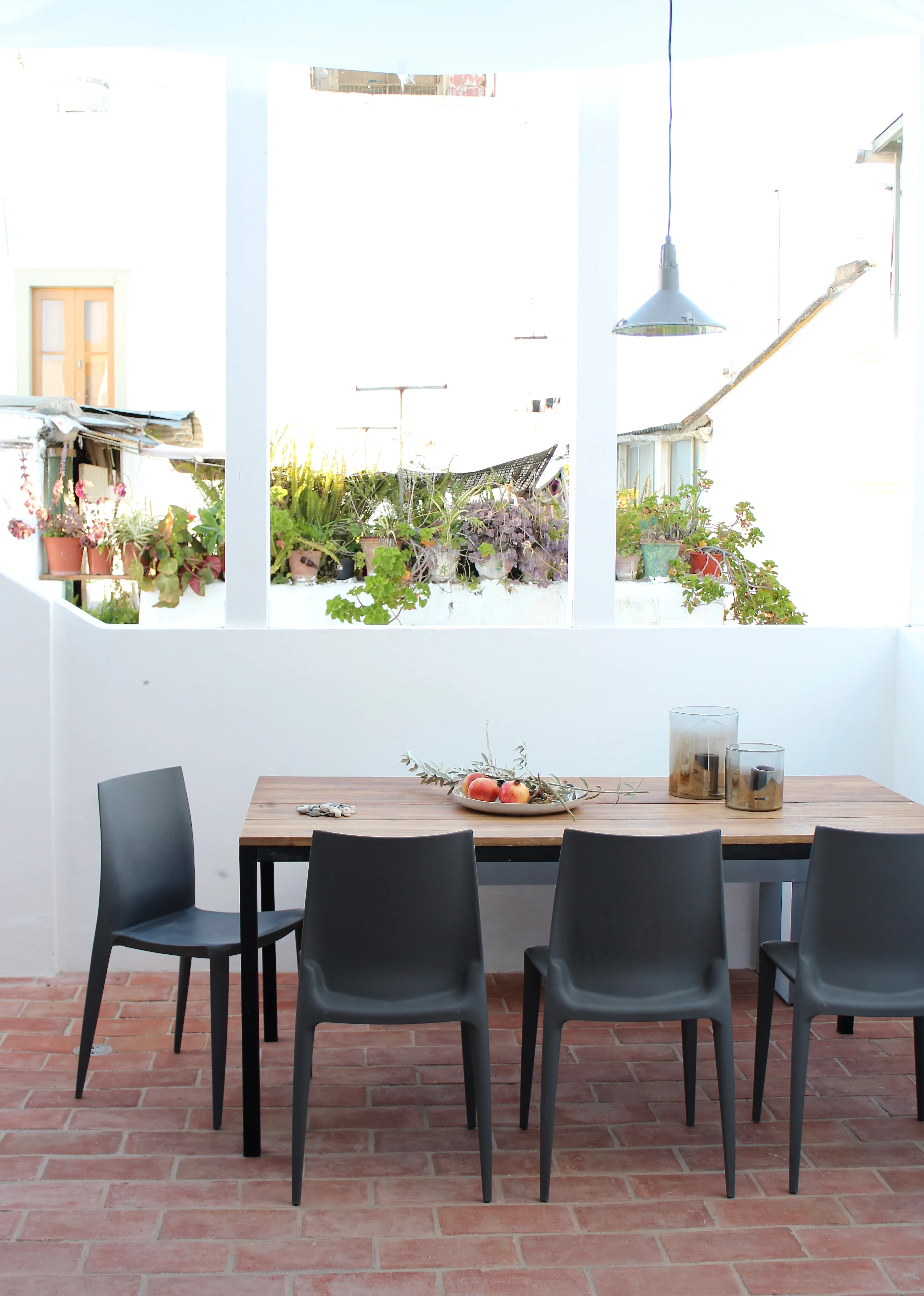 Outdoor dining area on Casa Opala rooftop terrace in Algarve