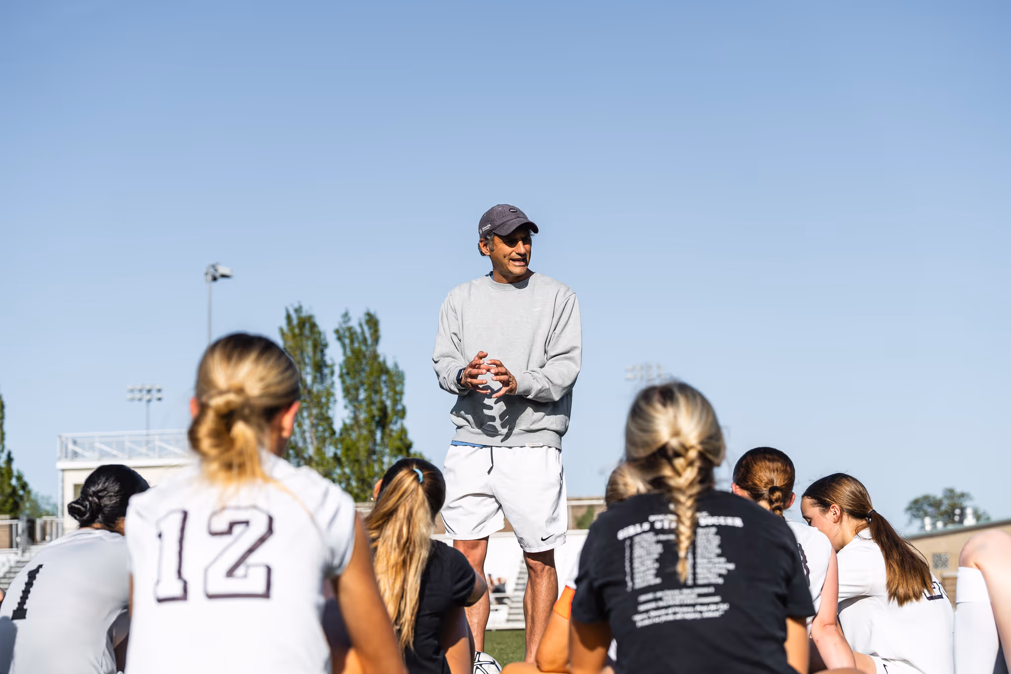 Matt Sahag coaching Dowling Catholic girls soccer