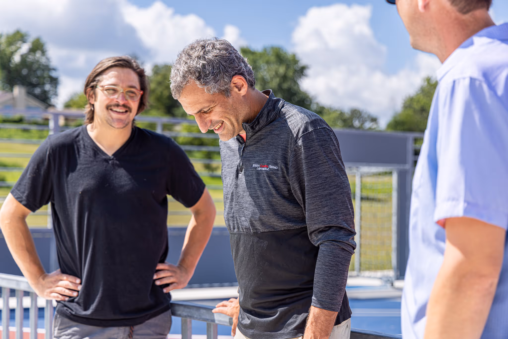 Matt Sahag smiling near Kick it Forward mini pitch