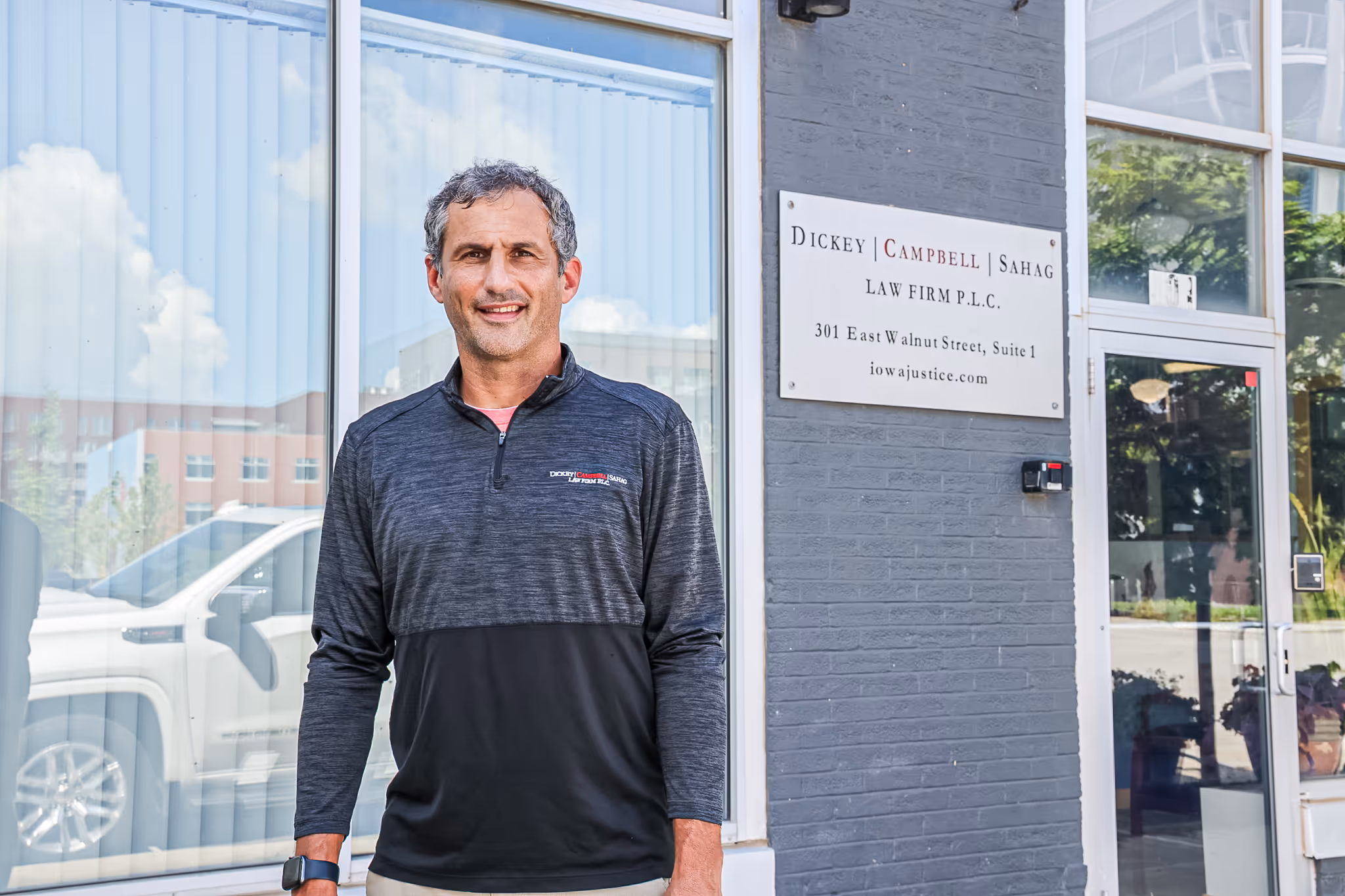 Matt Sahag standing outside law firm Dickey, Campbell, Sahag Law Firm P.L.C.