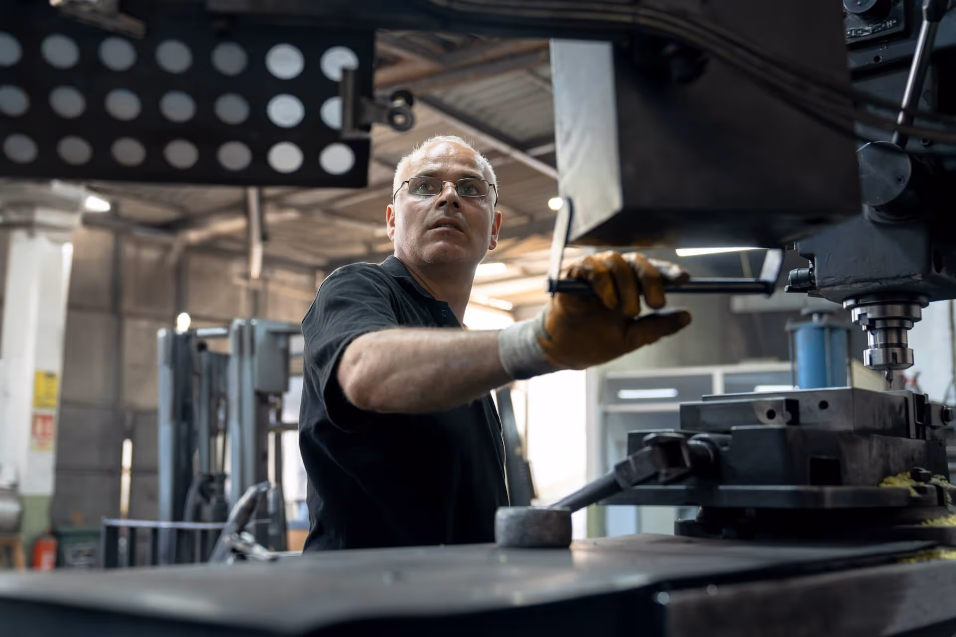 Man working on a CNC machine