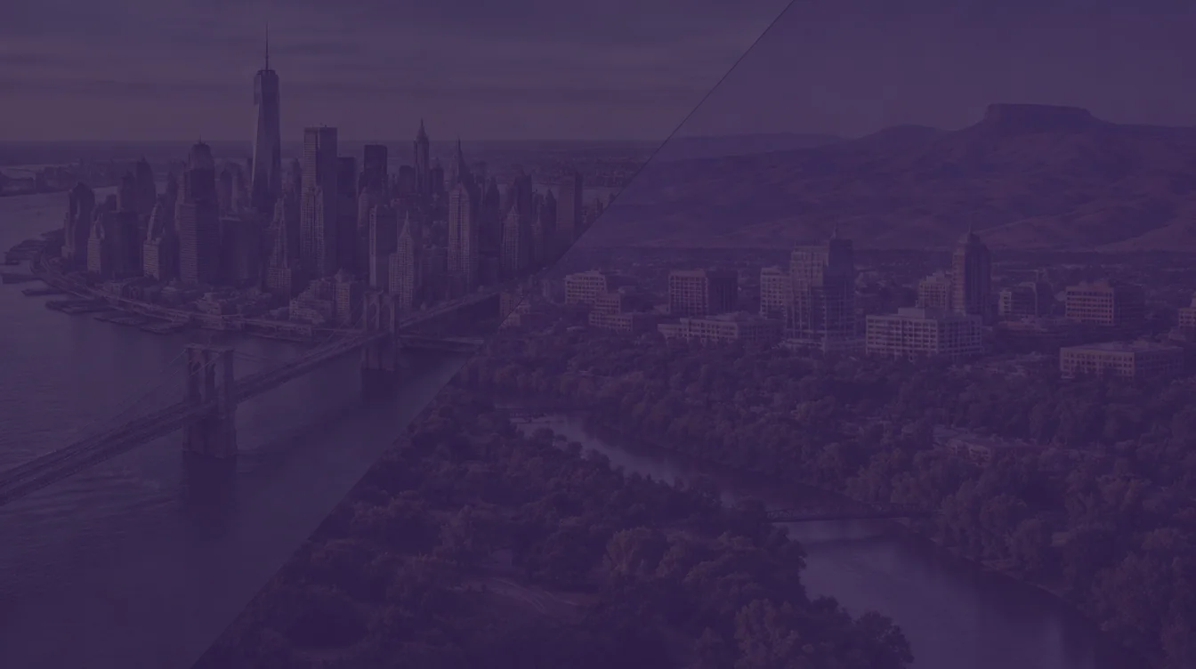 Aerial views of lower Manhattan with One World Trade Center and the Brooklyn Bridge, joined diagonally to downtown Boise beside the Boise River below the foothills, under a dark purple overlay