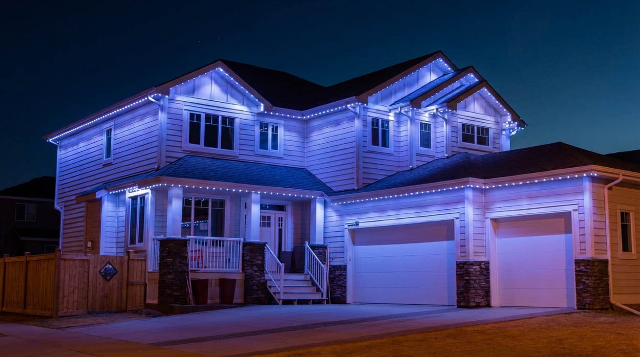 High-end residential project featuring smart LED soffit lighting with custom color options, installed by expert lighting contractors in Florida.