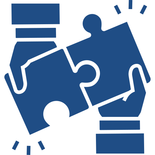 Two hands joining puzzle pieces, representing partnerships