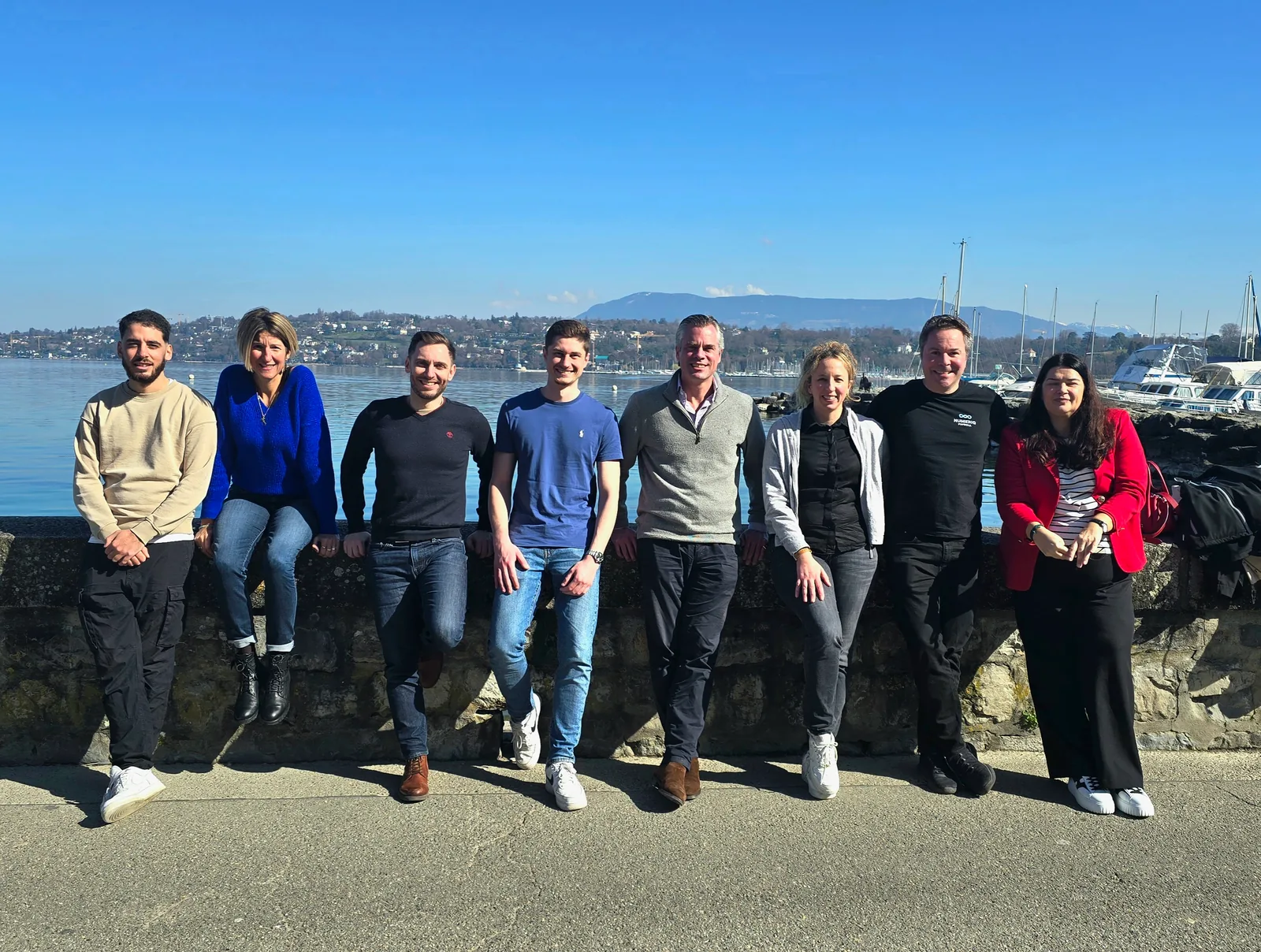 Numeriq's payroll and Employer of Record team by Lake Geneva
