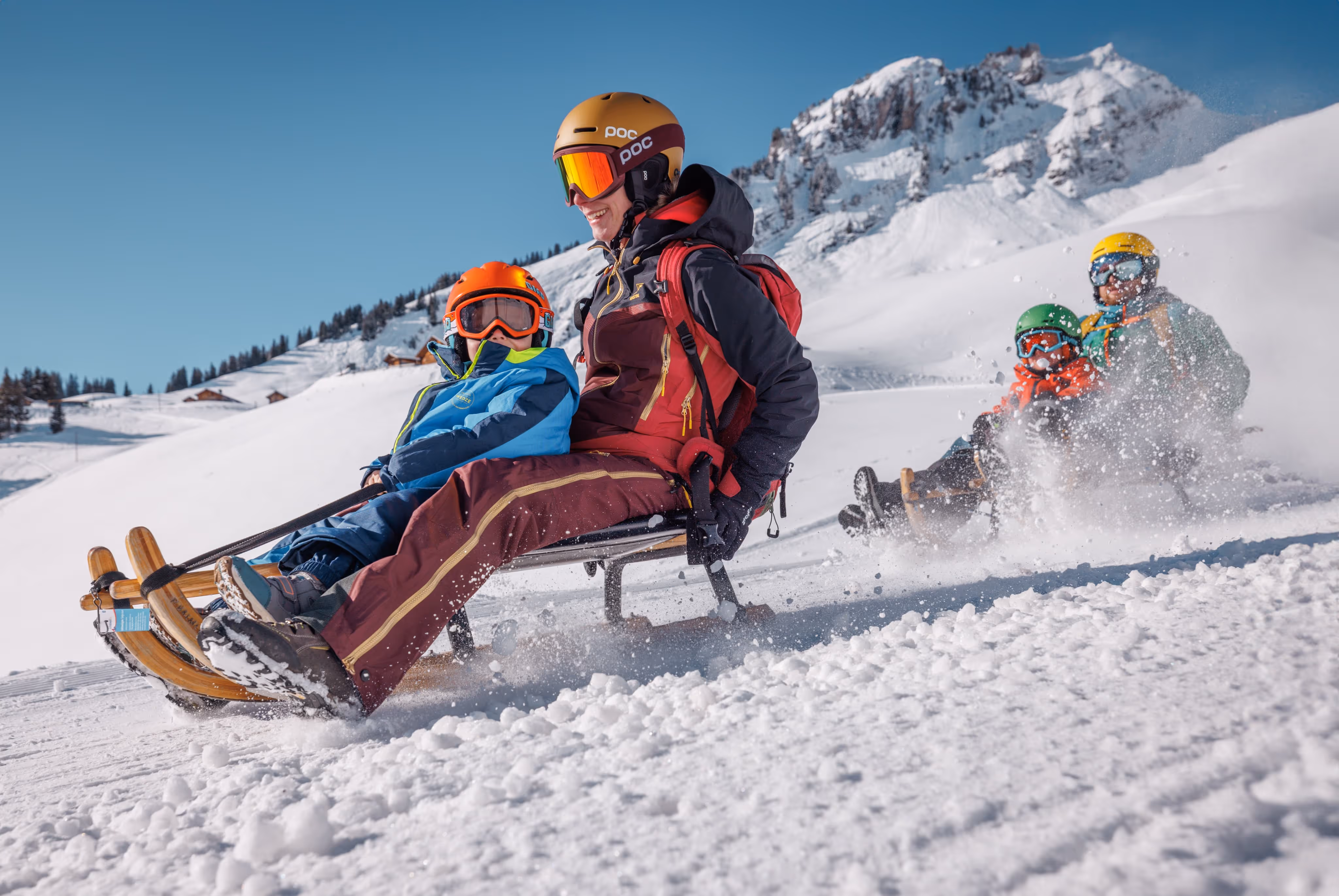 Sledding from snowy Alpine mountains