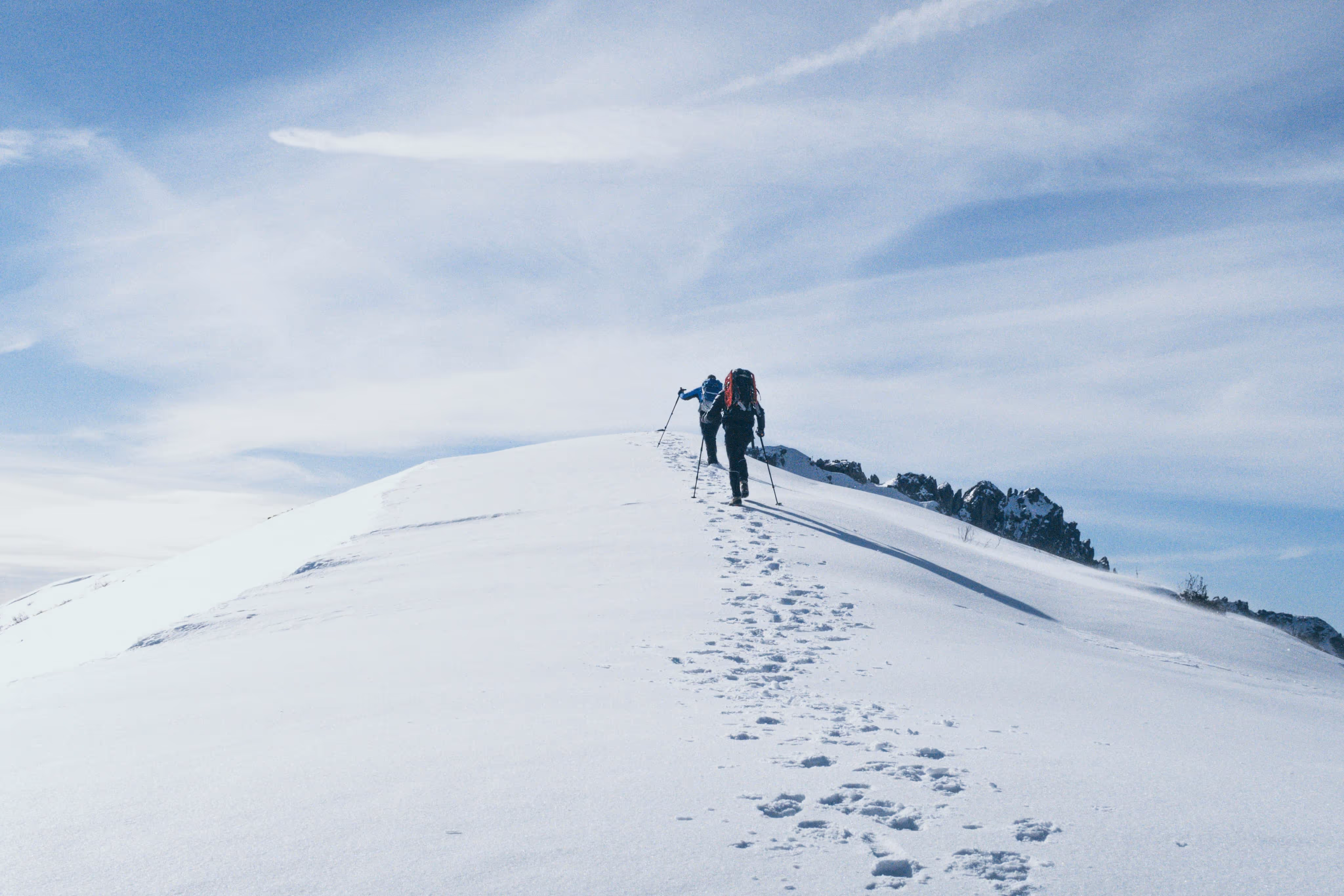 Climbing on snowy Alpine mountains