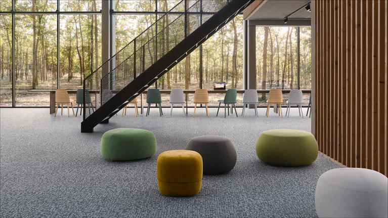 With the innovative EcoBase® carpet tiles, Tarkett shows how the circular economy works in practice.