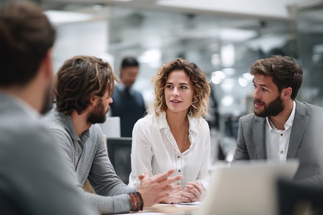 Diverse team discussing IT business solutions