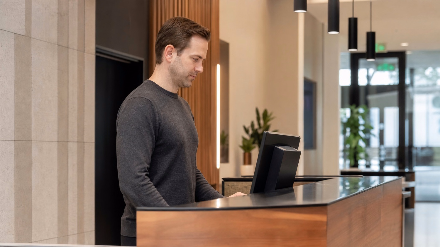RECEPTION AREA An IT professional one person standing at a front reception d