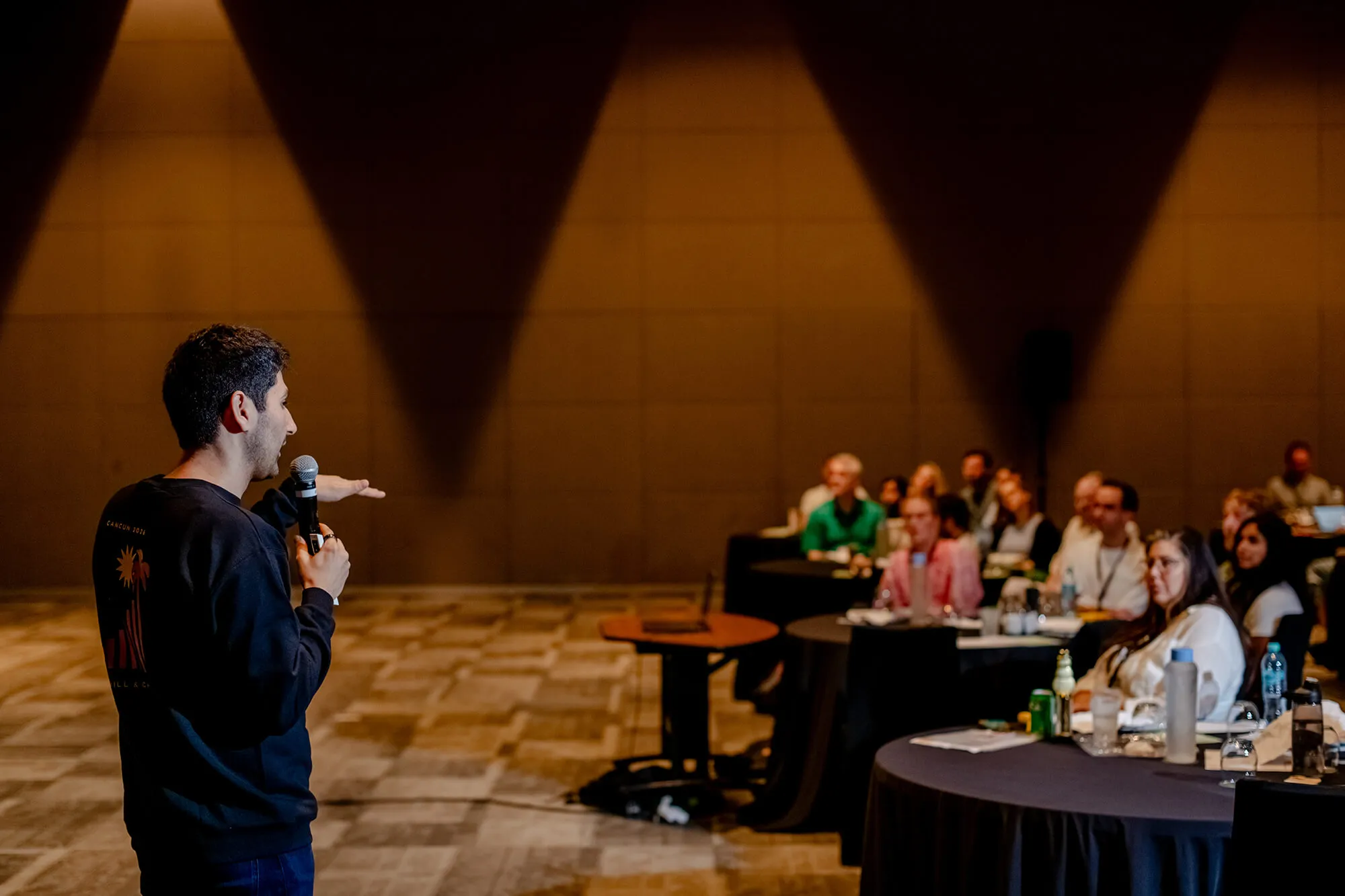 Workera CEO Kian Katanforoosh speaking on stage during the 2026 Cancun retreat