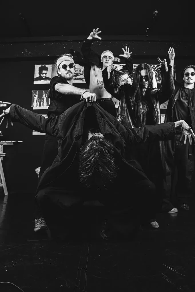 Kuga Studio mentors dancing together in the studio.