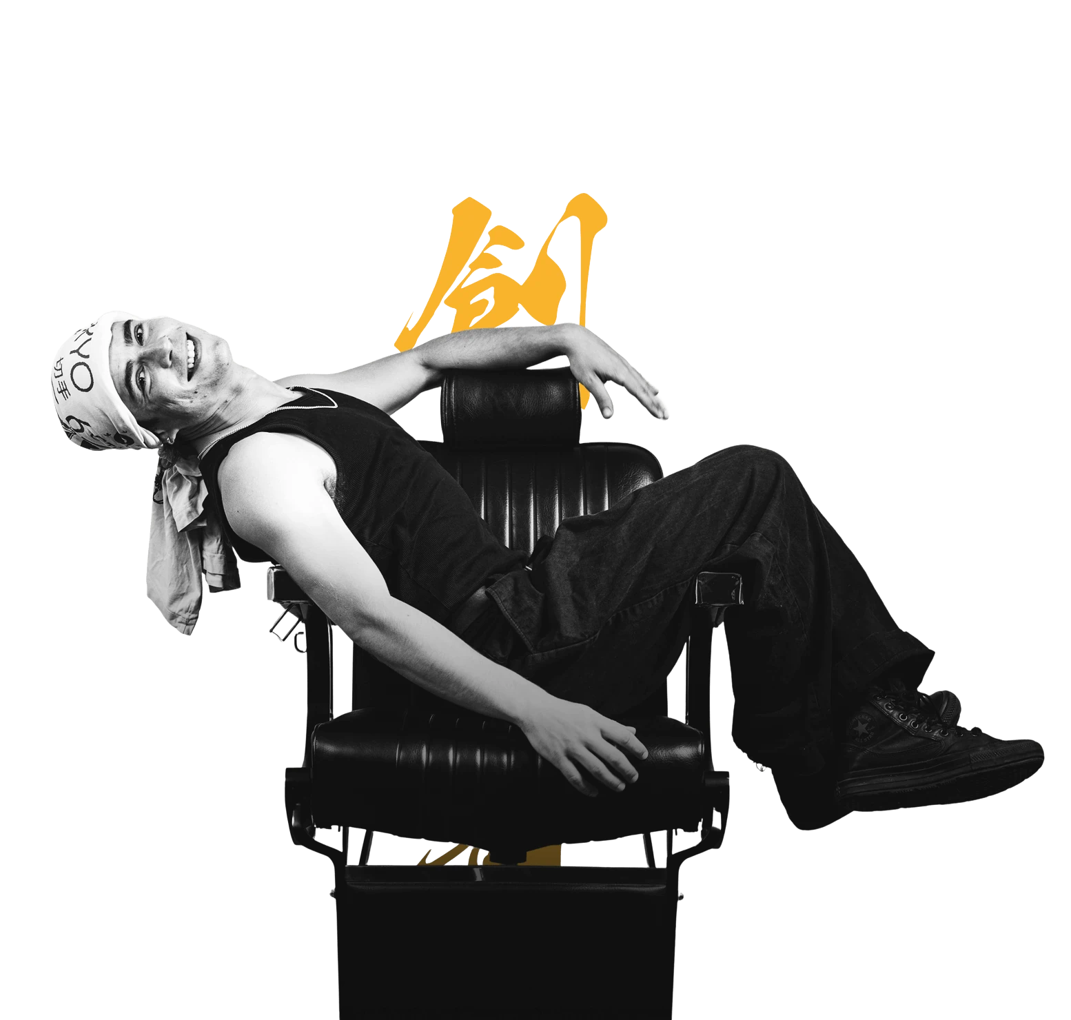 Founder Gašper sitting on a chair smiling at the camera.