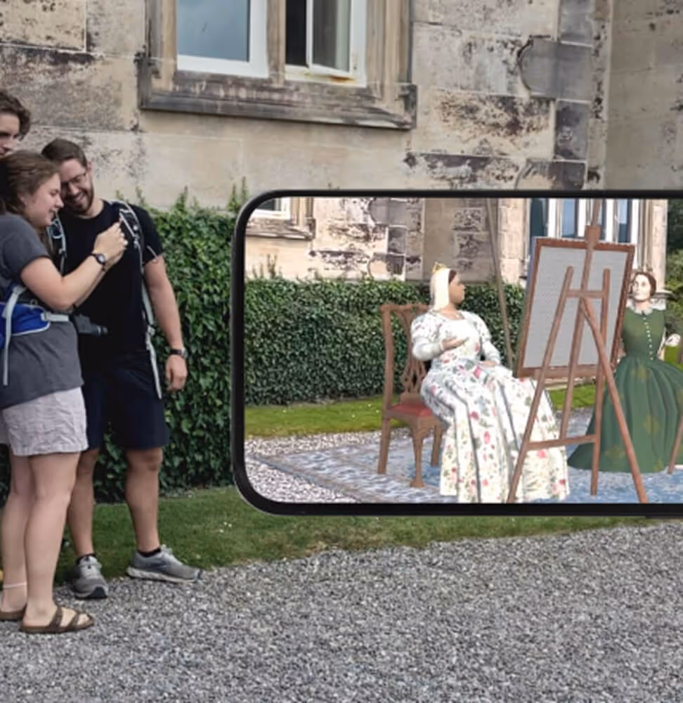 A group of people taking a picture of a painting.