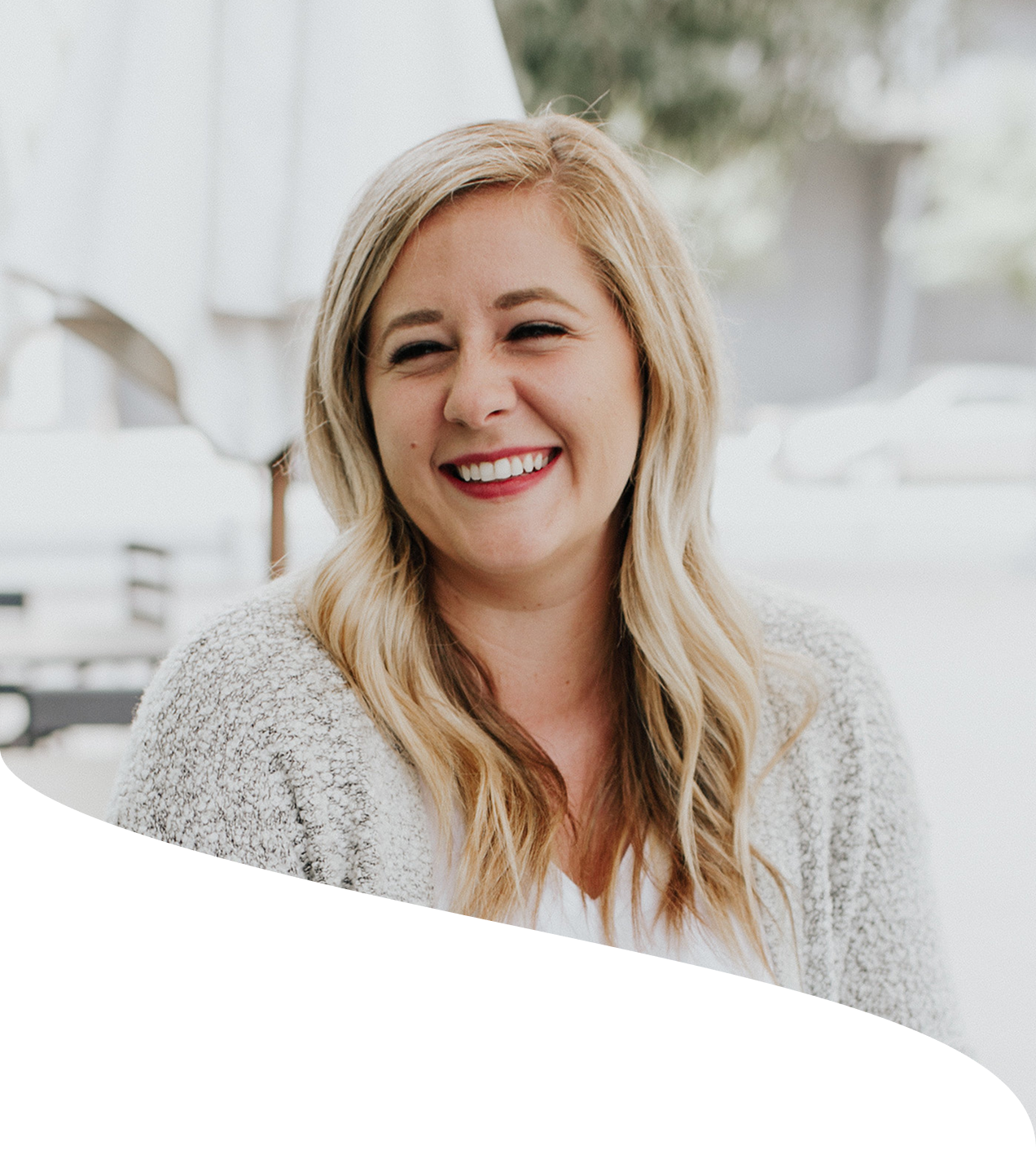 Portrait of Madison Fournier, Co-Founder & CMO of Soaak Technologies, smiling at the camera.