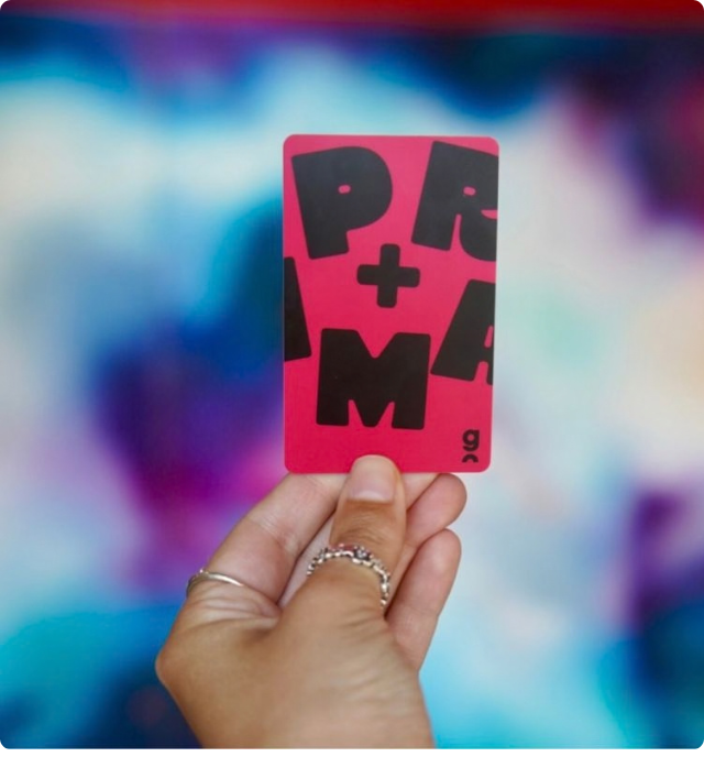 Image of a hand holding a Prima plus membership card
