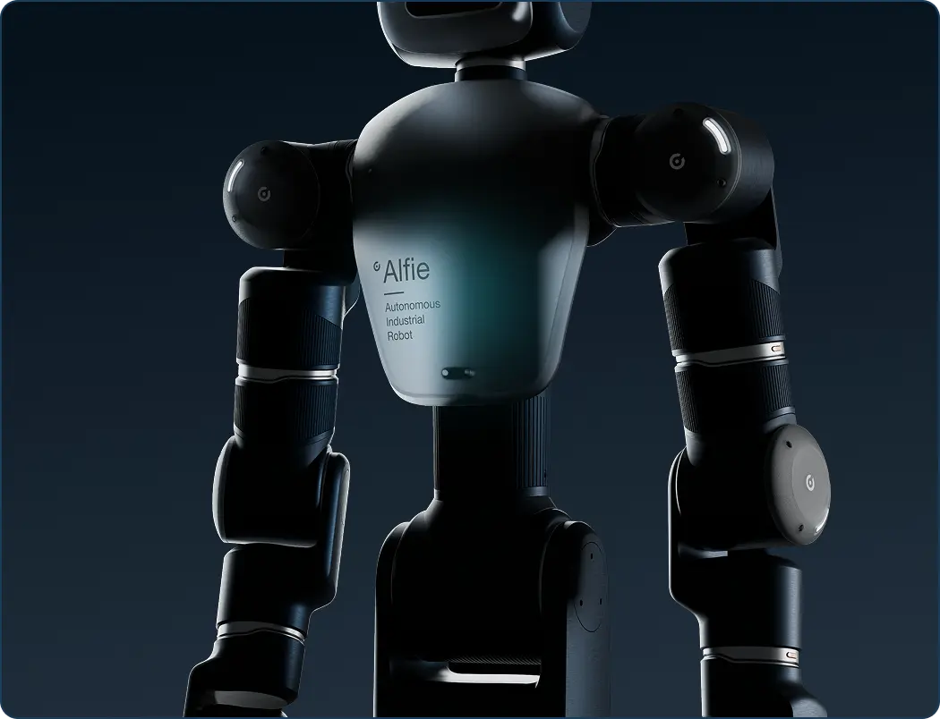 Close-up of a black autonomous industrial robot named Alfie with articulated arms against a dark background.
