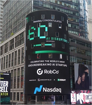 Large Nasdaq digital billboard congratulating AI disruptors RobCo for groundbreaking AI startups.