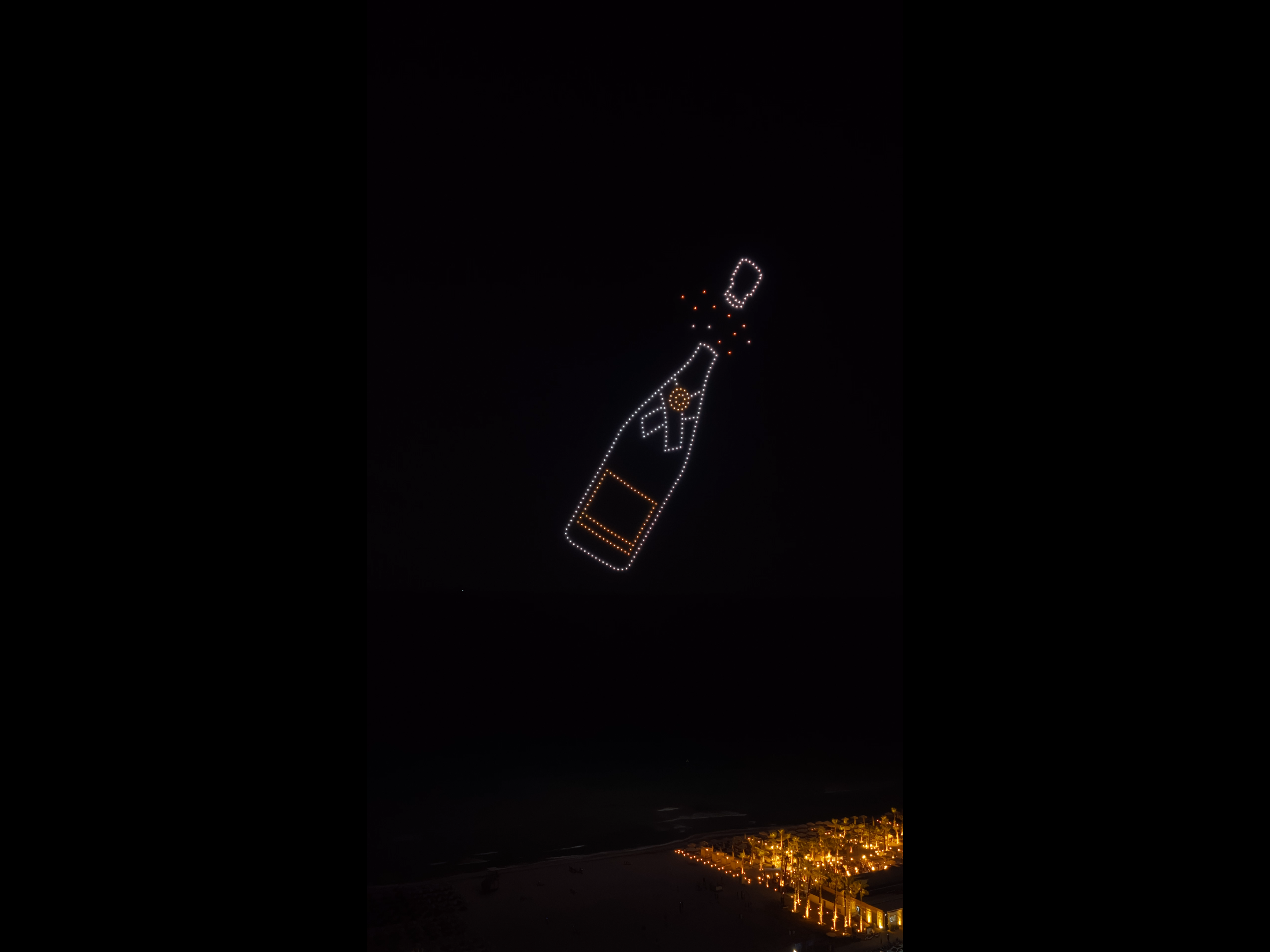Mandala Luxury Seaside drone show featuring Moët & Chandon bottle by Drônira, image 3 of 8
