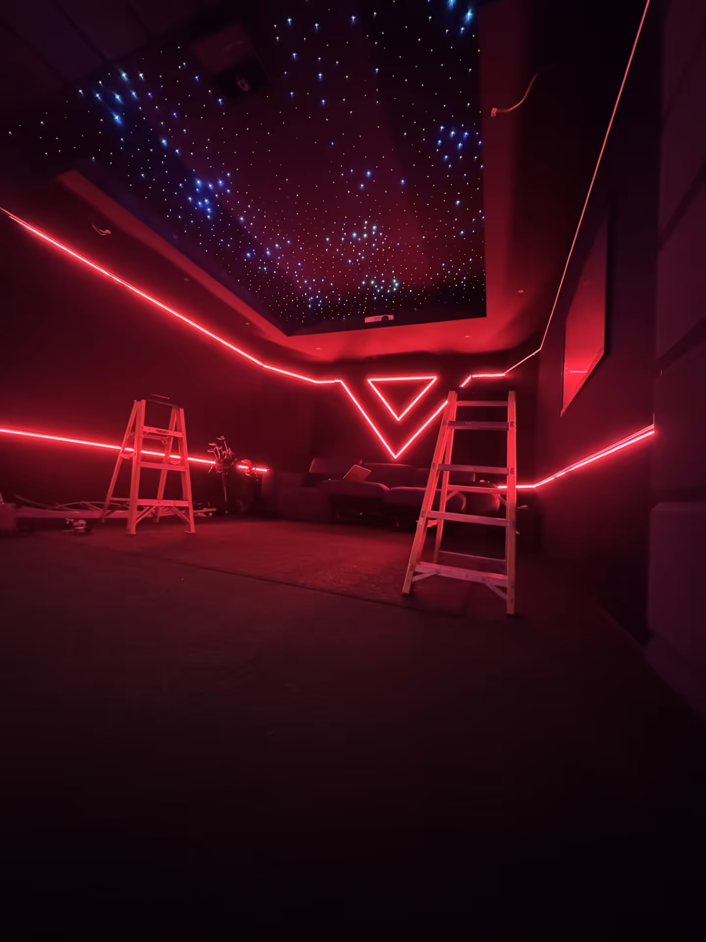 Red lights illuminating a room installed by Lux Electrical Installations in Cambridge